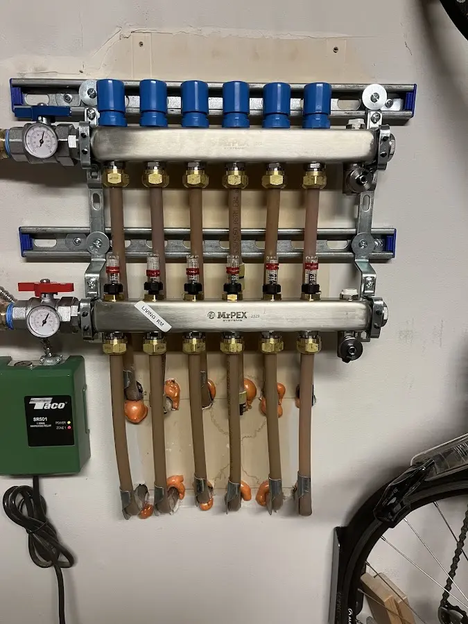 Plumber performing Water Heater Repair at a residential property in Breckenridge